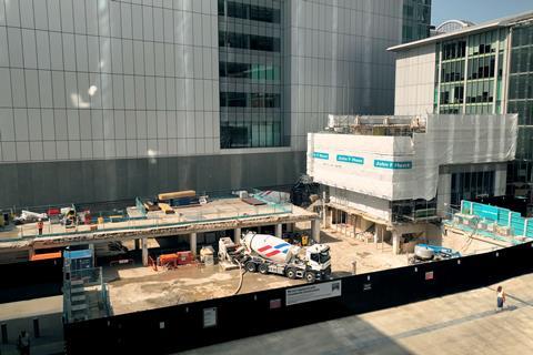 John F Hunt says piling work on stalled City office to finish next January